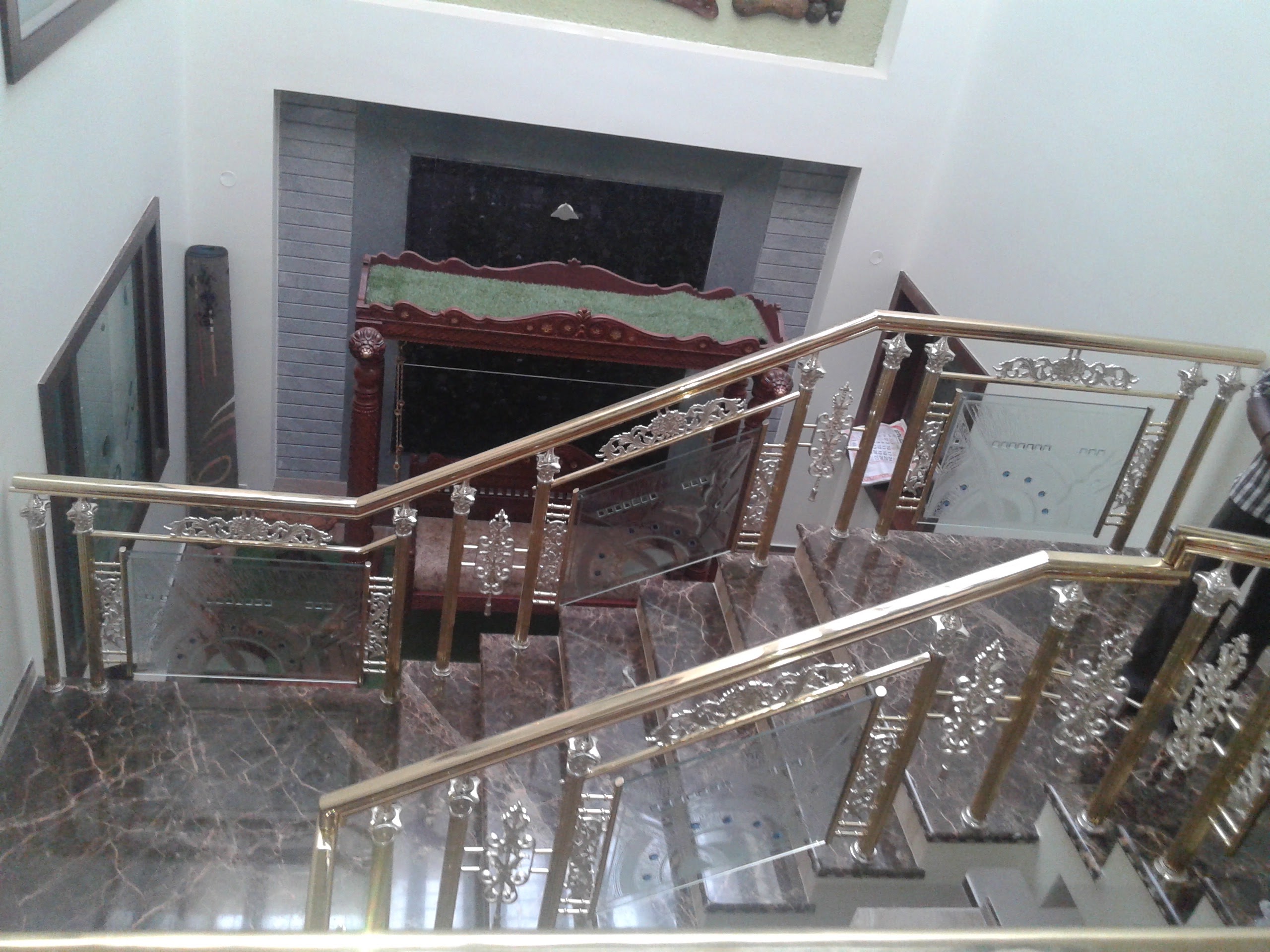 Curved Brass Stair Railing